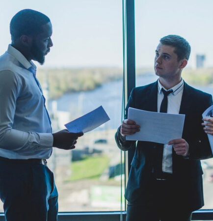 A professional mortgage broker at Financio reviewing bank policies to maximize a client's chances of home loan approval in Sydney.